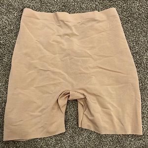 Skims barely there low back short